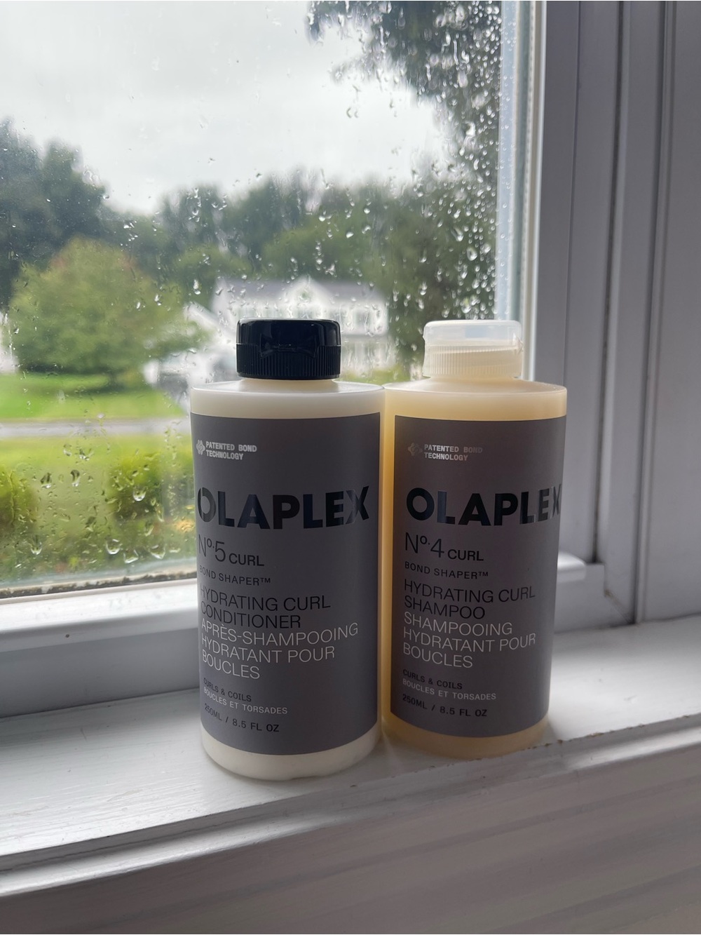 OLAPLEX Hydrating Curl Shampoo & Conditioner Bottles - Cream and Black Accents